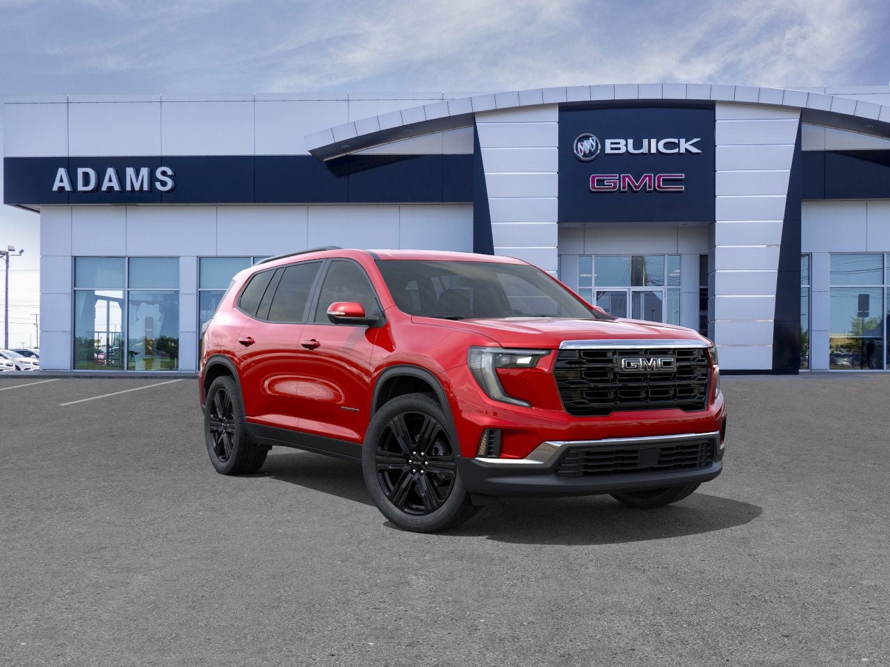 2026 GMC Acadia Elevation in Volcanic Red Tintcoat — front three-quarter view