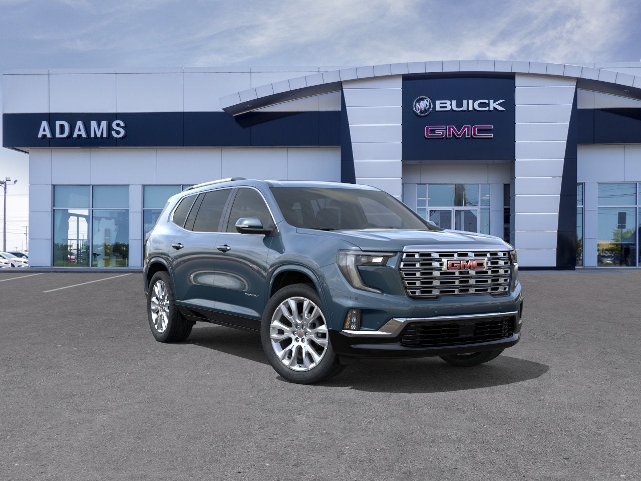 2026 GMC Acadia Denali in Downpour Metallic — front three-quarter view