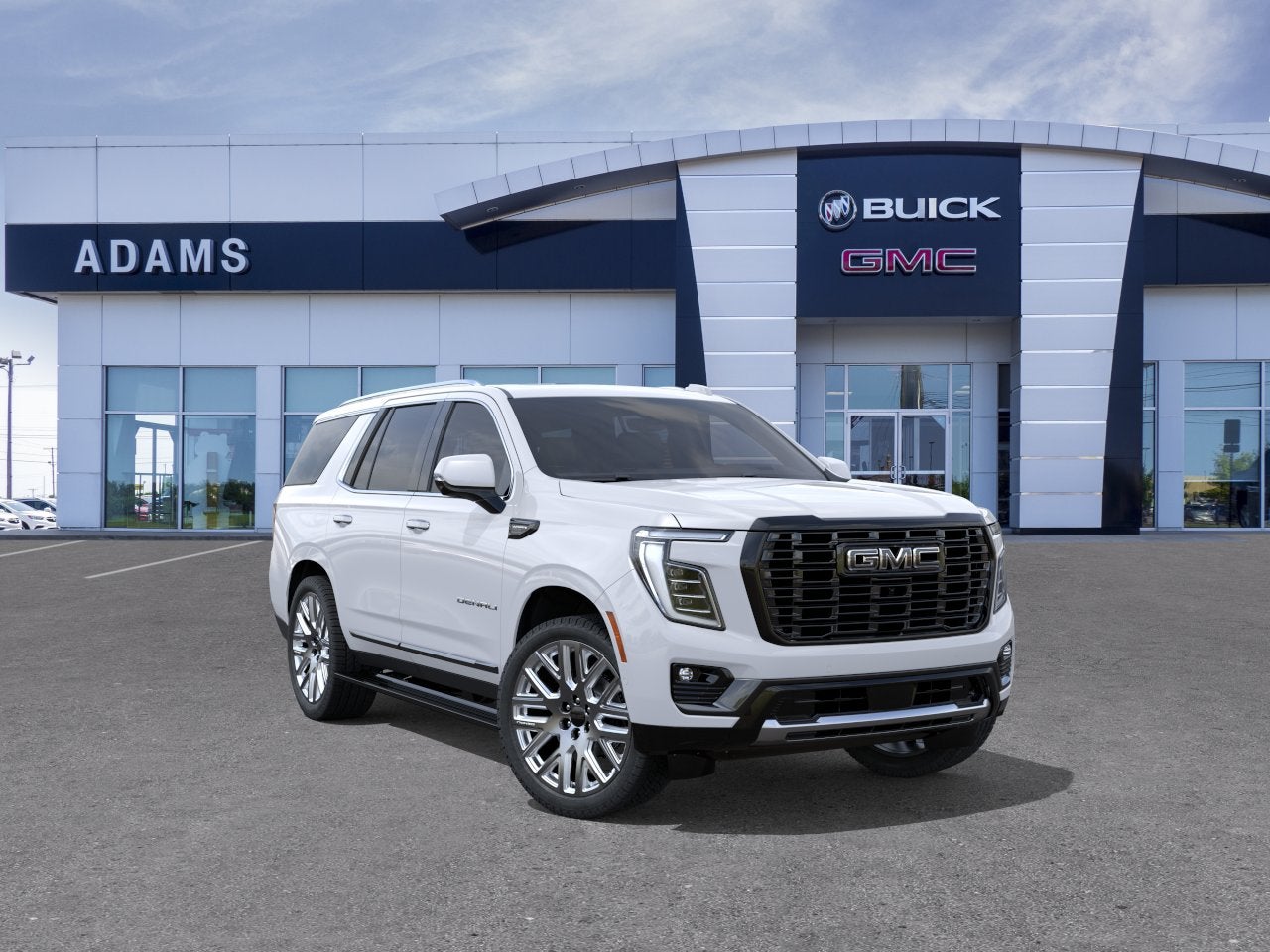 2026 GMC Yukon Denali Ultimate in Glacier White Tricoat — front three-quarter view