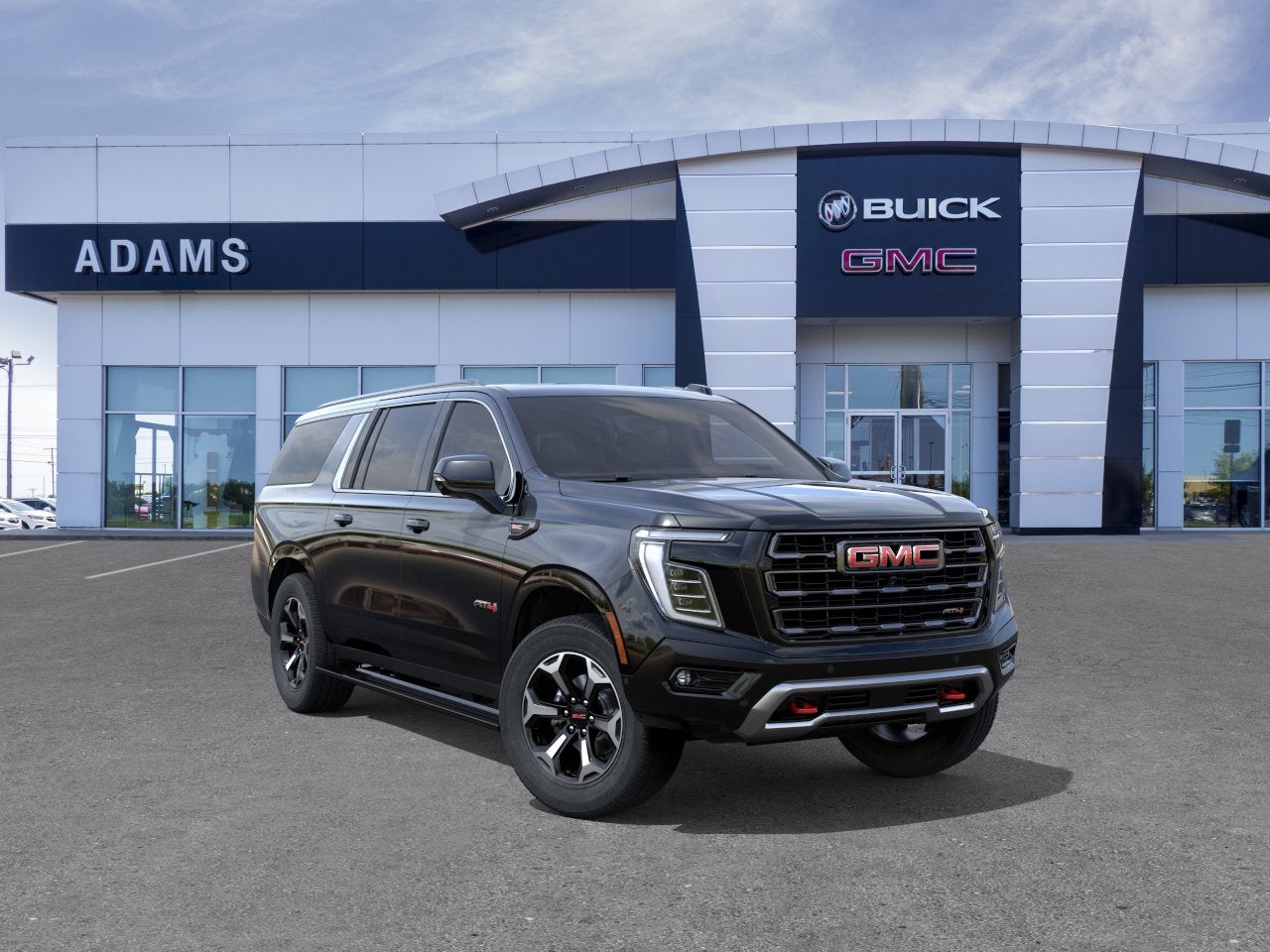 2026 GMC Yukon XL AT4 Ultimate in Onyx Black — front three-quarter view