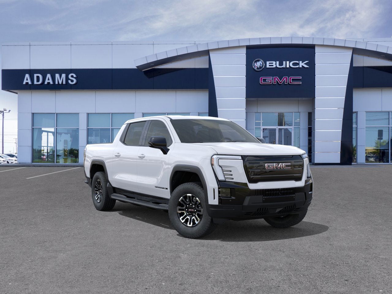 2026 GMC Sierra EV Elevation Extended Range in Summit White — front three-quarter view
