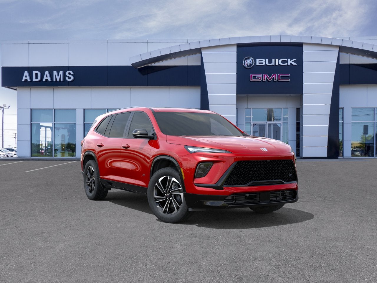 2026 Buick Enclave Sport Touring in Cherry Red Tintcoat — front three-quarter view