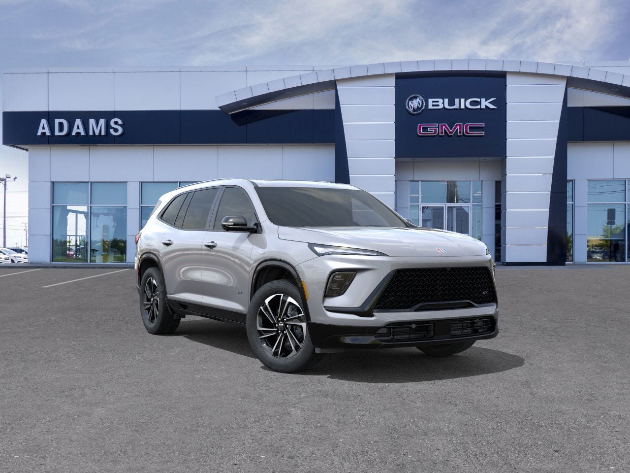 2026 Buick Enclave Sport Touring in Moonstone Gray Metallic — front three-quarter view