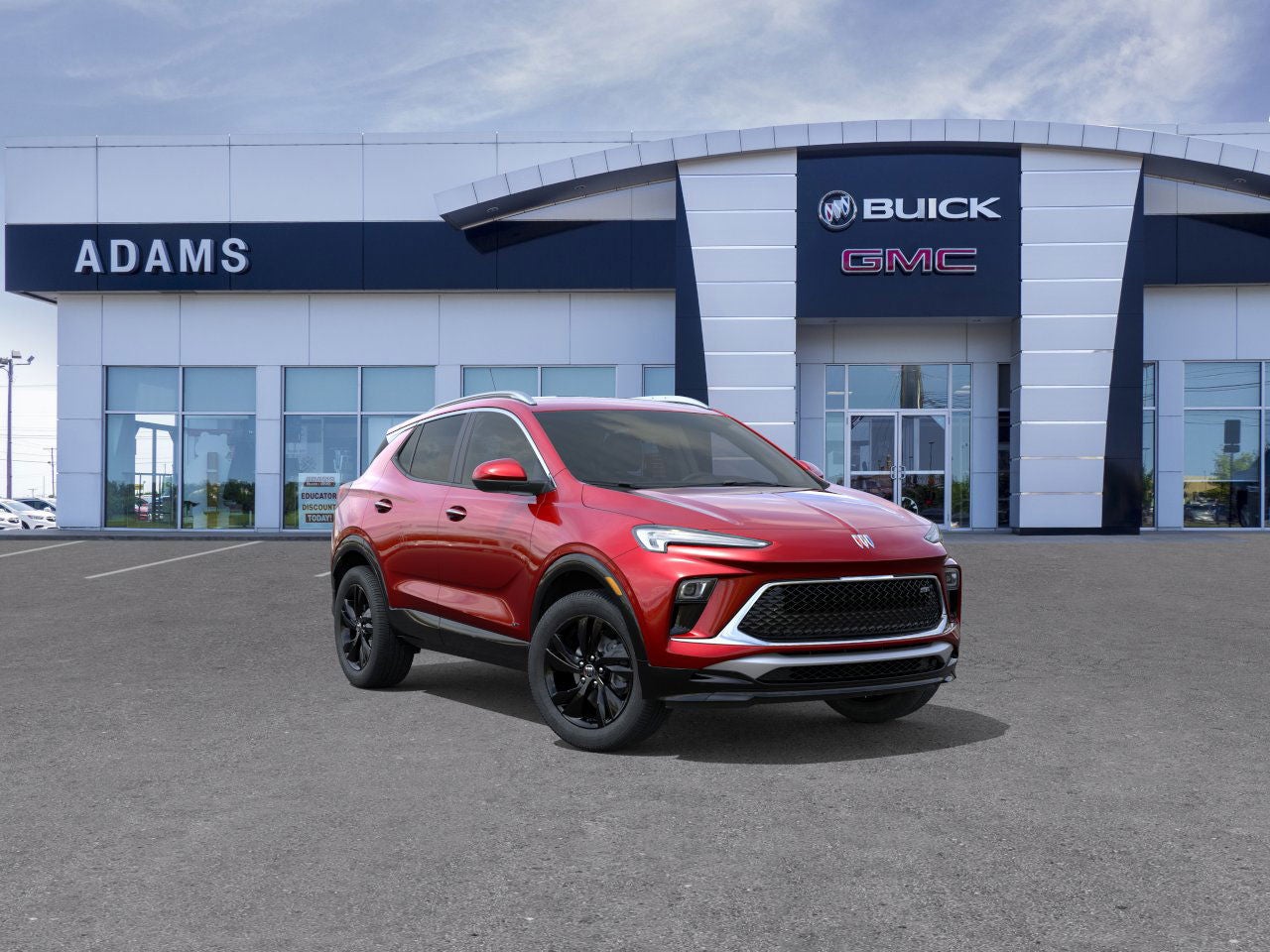 2026 Buick Encore GX Sport Touring in Brilliant Red — front three-quarter view